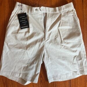 Beige Greg Norman golf shorts